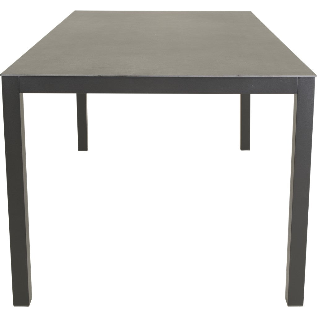 Rechthoekige tafel met donkergrijs werkblad en vier rechte poten.
