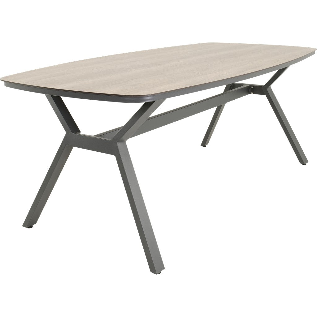 Ovale eettafel met licht houten blad en donkergrijze metalen onderstelpoten