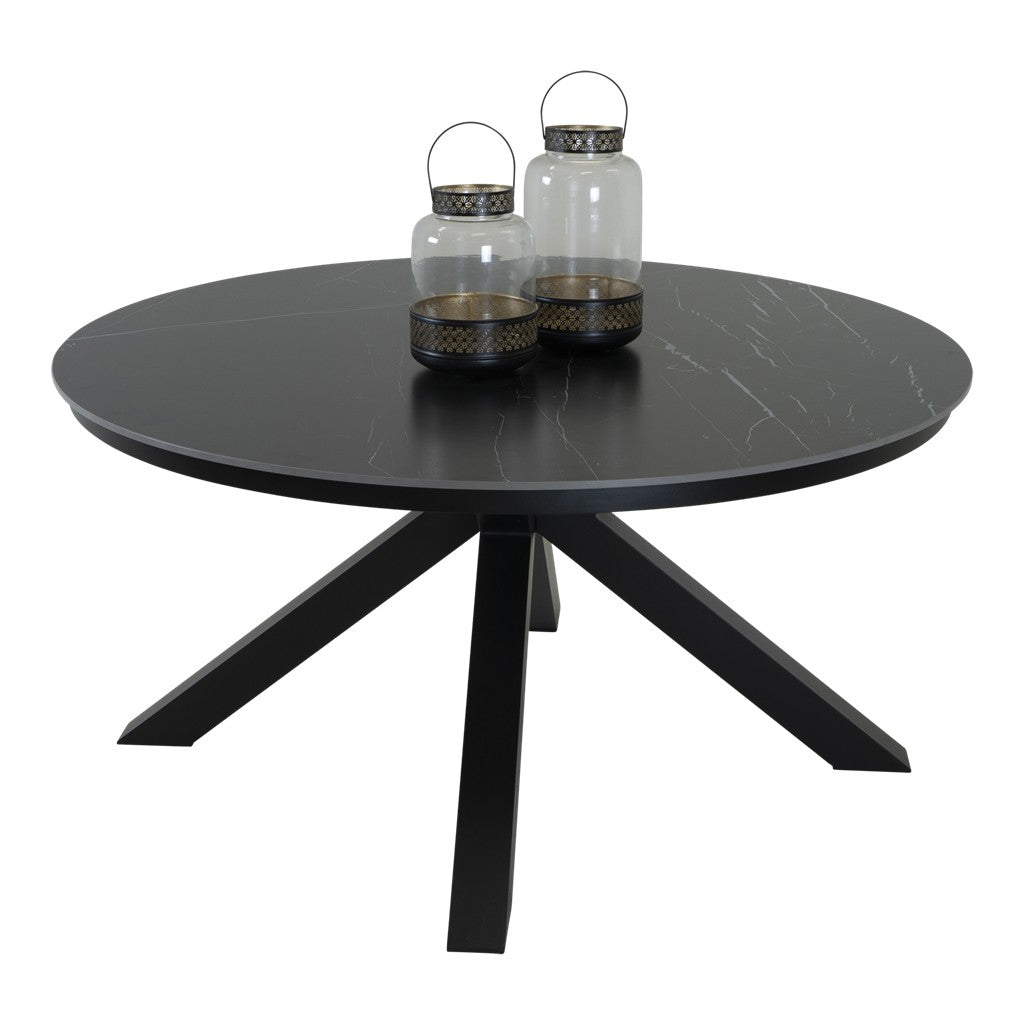 Ronde eettafel met donkergrijs marmerlook blad en zwarte poten, met servies bovenop