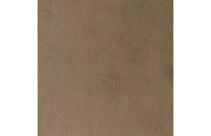 Beige geribde kussenstof in close-up met zichtbare textuur en stiknaden