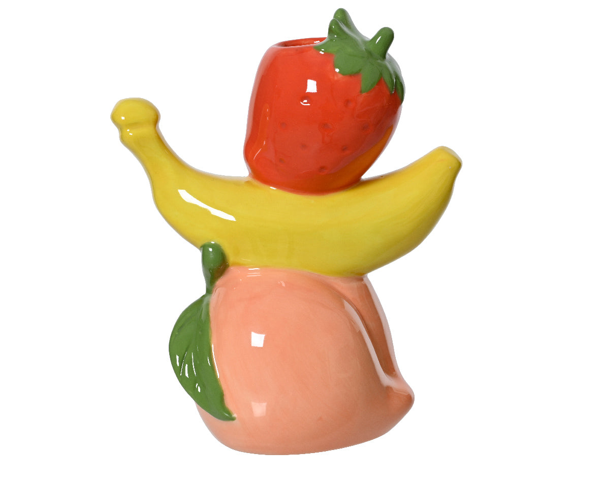 Porseleinen vaas in vorm van aardbei met banaan en groen blad, rood en geel