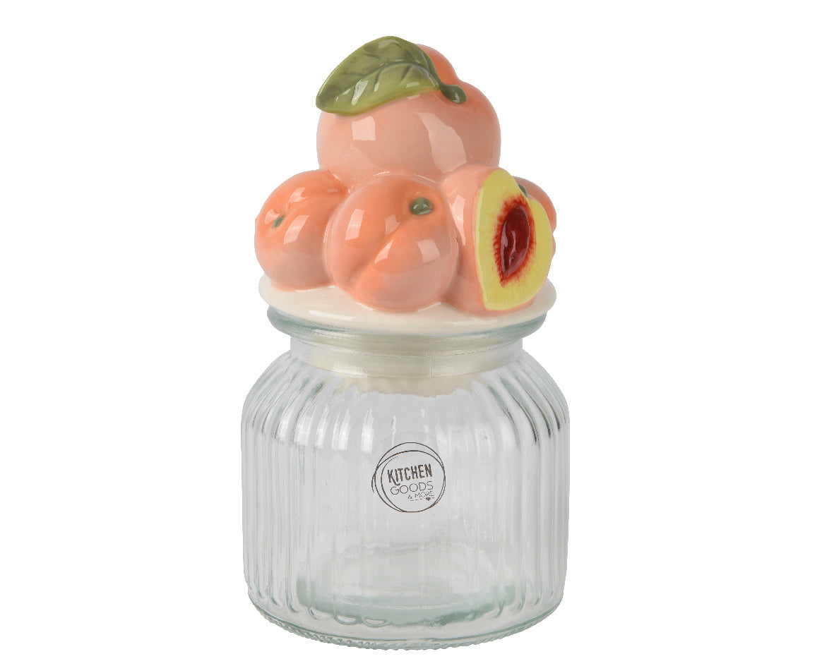 Glazen opbergpot met ribbelstructuur en fruitvormig deksel met perzikdesign