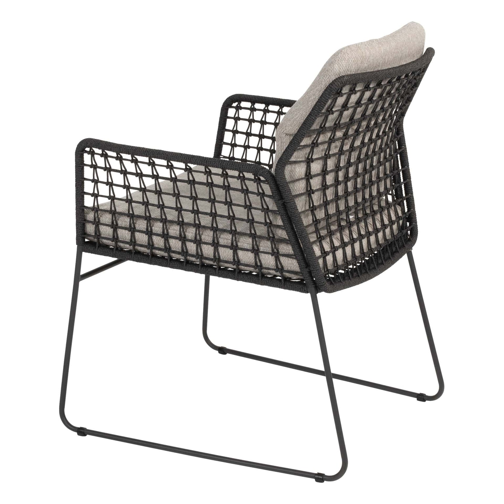 Eetkamerstoel met zwart draadframe en lichtbeige rug- en zitkussen, rechte metalen poten