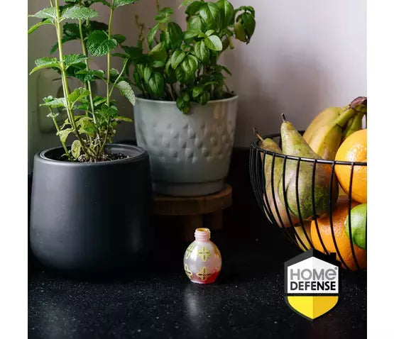 Fruitvliegjesval HOME DEFENSE: kleine flesval met etiket