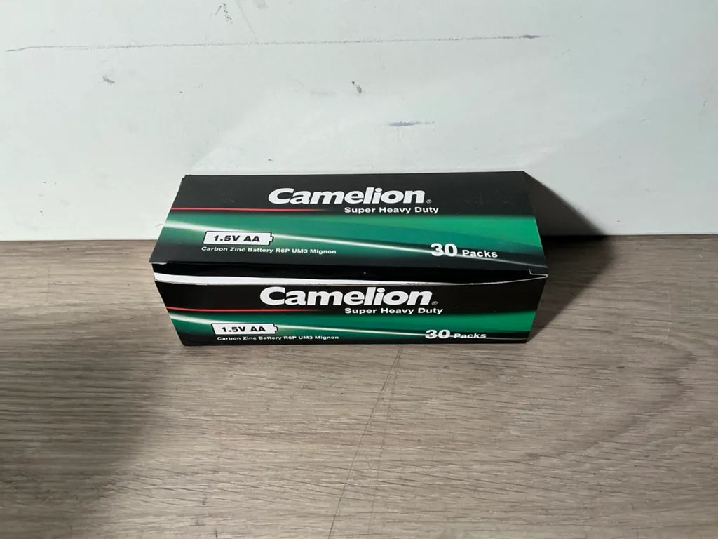 Camelion AA-batterijpacks in zwart-groene kartonnen dozen