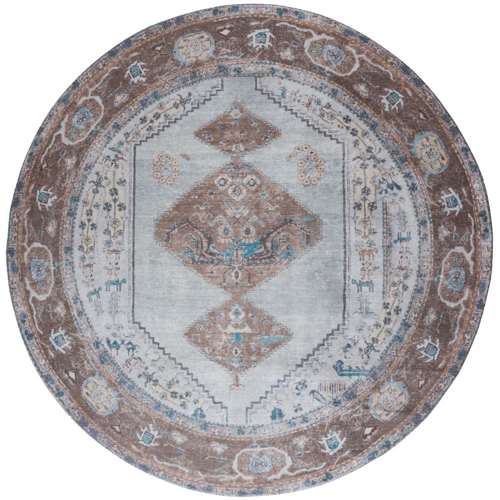Rond vloerkleed met geometrisch boho patroon in blauw, bruin en beige, Ø120 cm.