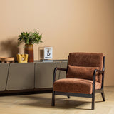 Bruine chenille fauteuil met donker frame, armleuningen en brede zitting.