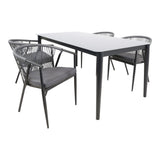 Witte eettafel met grijze stoelen met geweven rug en grijs zitkussen