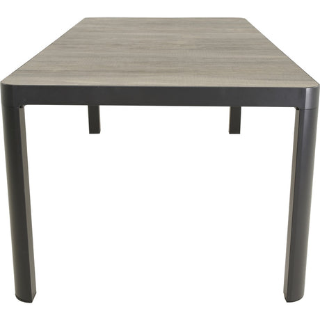 Rechthoekige eettafel met grijs houtlook blad en zwarte poten, bovenaanzicht