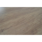 Close-up van houtstructuur op tafelblad met matte beige nerf