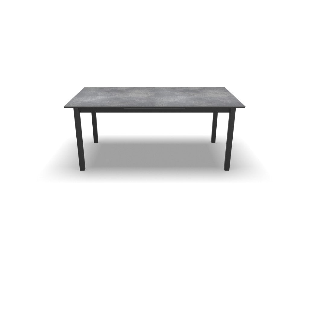 Uittrektafel met betonkleurig blad en zwarte poten, rechthoekig model