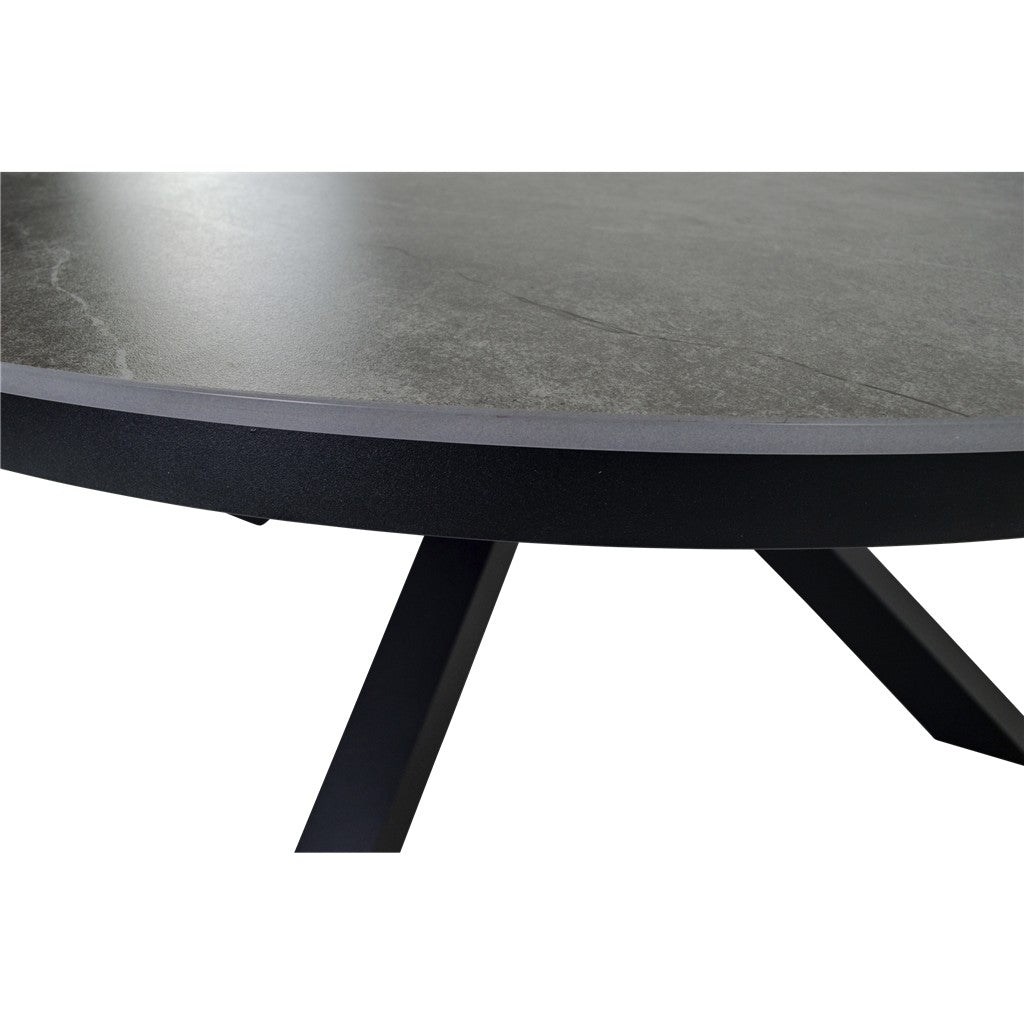 Ronde tafelrand met betonlook oppervlak en zwarte metalen poot