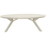 Ovale crème eettafel met langwerpig blad en vier schuine poten.