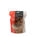 Zak met beuken rookhout chunks, Barbecook, met zichtbaar houtmateriaal.