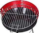 Ronde rode houtskoolbarbecue met grillrooster boven de zwarte vuurkom