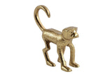 Gouden kattenbeeldje met staart omhoog en open bek.