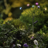 Solar tuinprikker op hoge planten met felgekleurde LED-bloemen