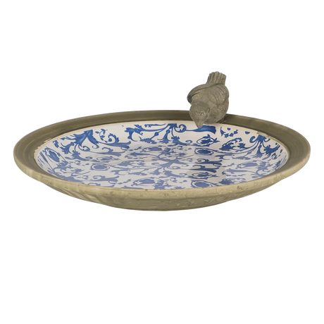 Keramische vogelbadschotel met blauwe Delfts-blauw ornamenten en grijze vogel bovenop