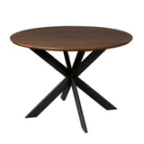 Ronde eettafel met bruin houten blad en zwarte kruispoten, centraal onderstel.