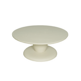 Crème salontafel met rond blad en brede schijfvormige voet
