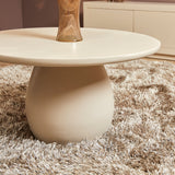 Ronde salontafel met wit blad en bolvormig onderstel, taps toelopend