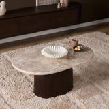 Ronde salontafel met licht marmeren blad en donker geribbelde poot