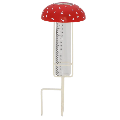 Vliegenzwam regenmeter met rode dop, transparante meetbuis met schaal en witte staanders