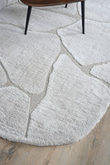 Vloerkleed met afgeronde rand en steentjesmotief in lichtbeige/grijs