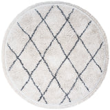 Rond vloerkleed met crèmekleurige ondergrond en blauw ruitpatroon, geschulpte poolrand