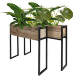 Plantenbak Faab set van 2 met houten bak en zwarte metalen poten, met groene planten