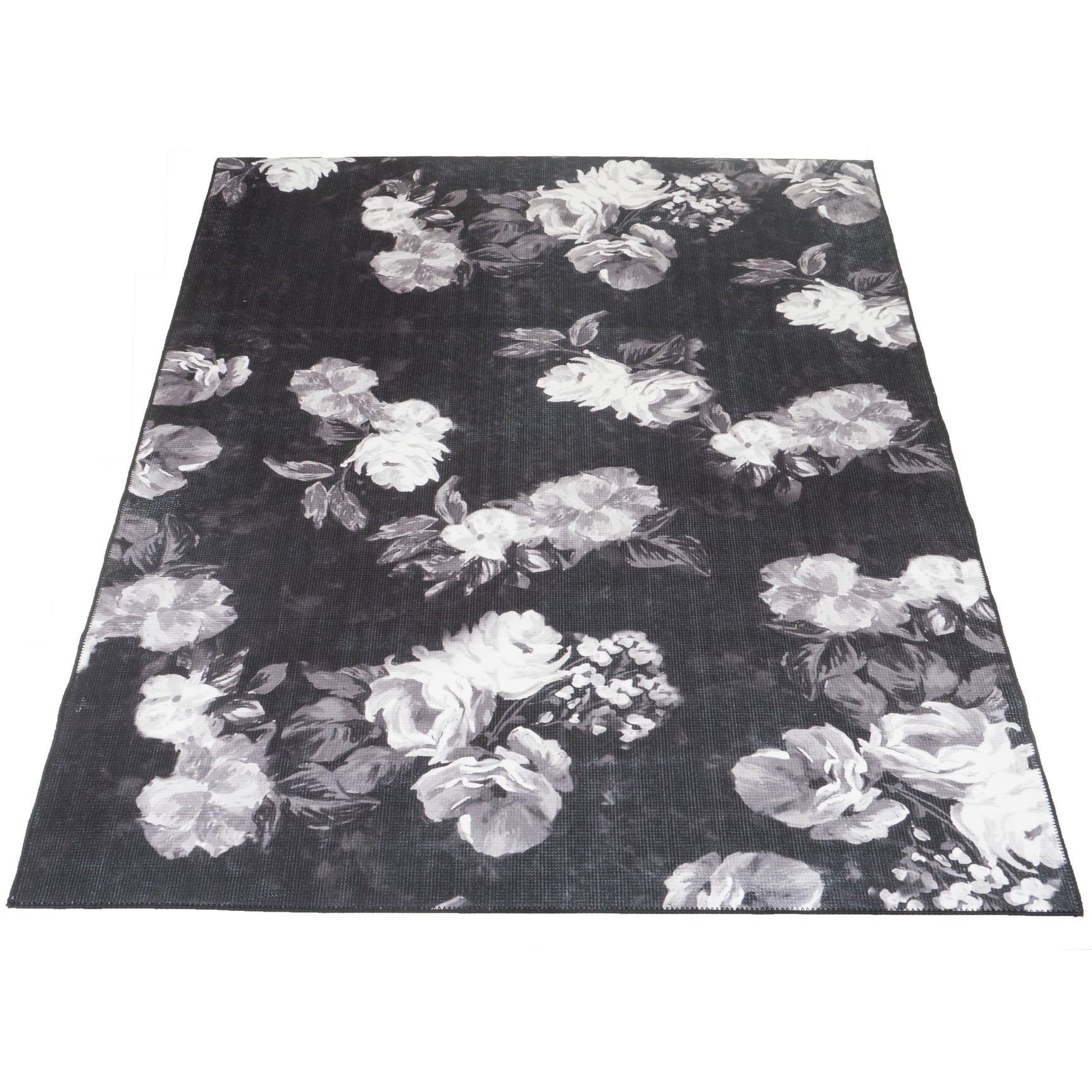 Zwart vloerkleed met grote witte bloemen
