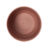 Ronde plantenpot delicate roze, bovenaanzicht met ingedrukte elho-markering.
