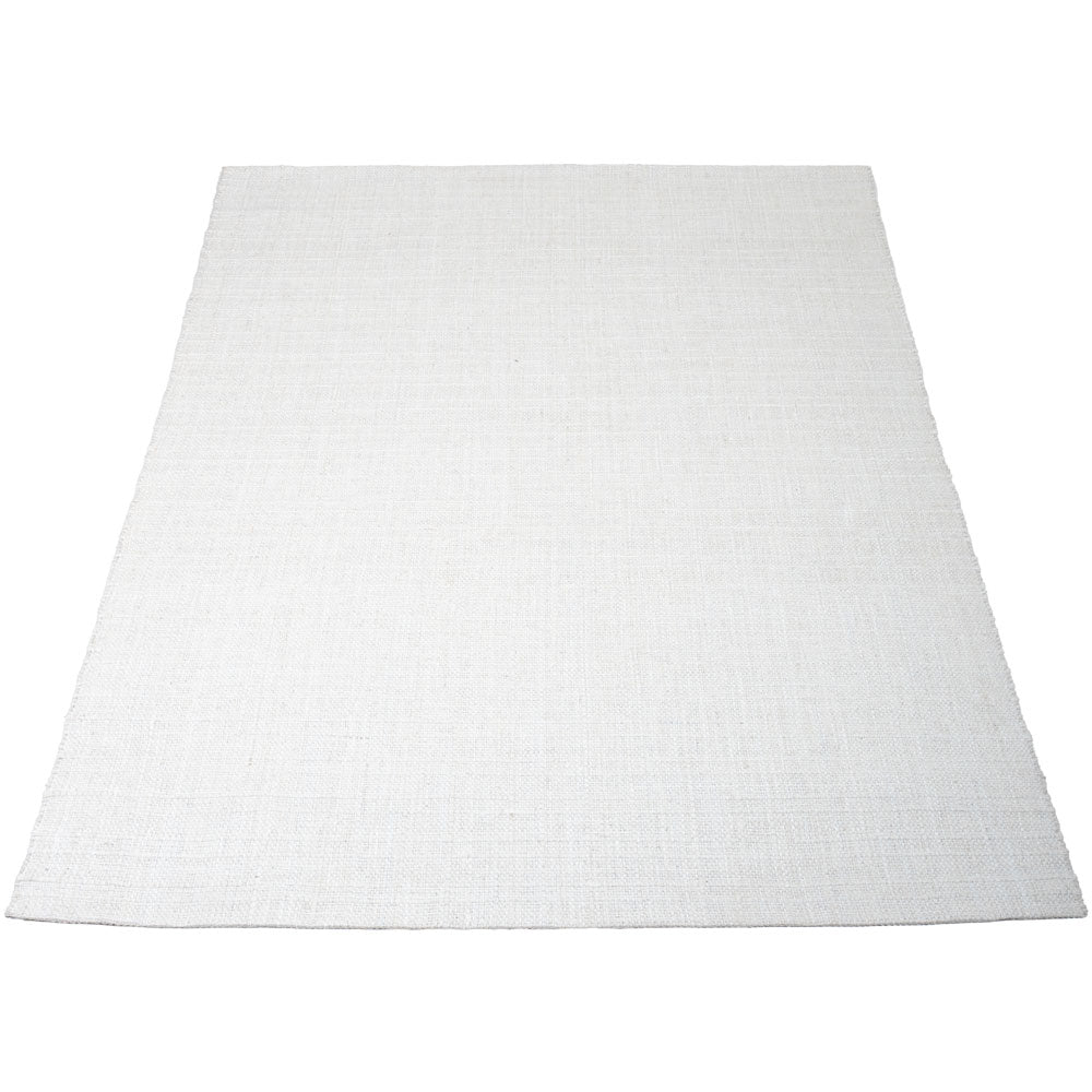 Vloerkleed met effen lichte beige kleur en vlak geweven textuur