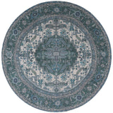 Rond vloerkleed met groenblauw en beige ornamenten, doorsnede ca. 120 cm.