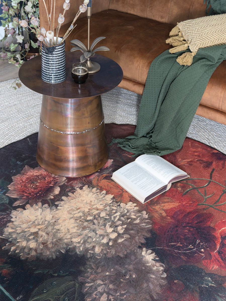 Rond vloerkleed met bloemen- en bladpatroon in beige, rood en groen